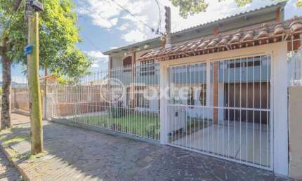 Casa com 4 quartos à venda na Rua Mathilde Zatar, 128, Nonoai, Porto Alegre, 300 m2 por R$ 795.000