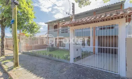 Casa com 4 quartos à venda na Rua Mathilde Zatar, 128, Nonoai, Porto Alegre, 300 m2 por R$ 795.000