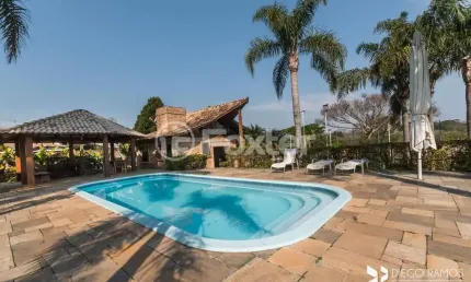 Casa em condomínio fechado com 4 quartos à venda na Estrada Lomba Do Vadeco, 825, Morada Gaúcha, Gravataí, 334 m2 por R$ 2.341.000