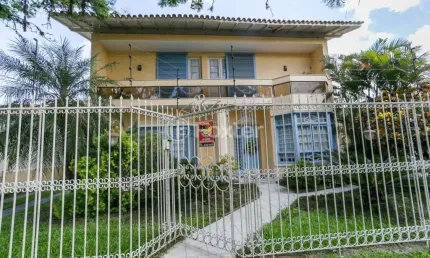 Casa com 3 quartos à venda na Travessa Trindade, 40, Jardim Lindóia, Porto Alegre, 281 m2 por R$ 1.235.000