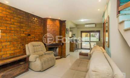 Casa em condomínio fechado com 3 quartos à venda na Rua Louro, 34, Hípica, Porto Alegre, 174 m2 por R$ 750.000