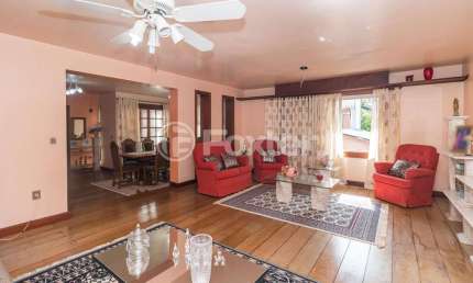 Casa com 2 quartos à venda na Rua Teixeira de Freitas, 911, Santo Antônio, Porto Alegre, 345 m2 por R$ 1.035.000