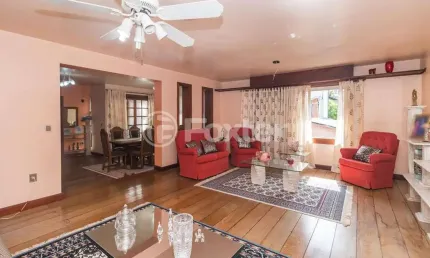 Casa com 2 quartos à venda na Rua Teixeira de Freitas, 911, Santo Antônio, Porto Alegre, 345 m2 por R$ 1.035.000