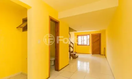 Casa em condomínio fechado com 2 quartos à venda na Rua Hilário Gonçalves Pinha, 120, Hípica, Porto Alegre, 80 m2 por R$ 242.250