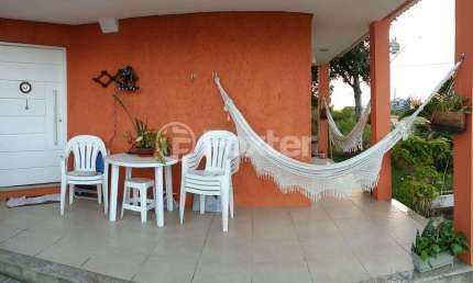 Casa em condomínio fechado com 3 quartos à venda na Avenida Senador Salgado Filho, 8500, Querência, Viamão, 342 m2 por R$ 1.150.000
