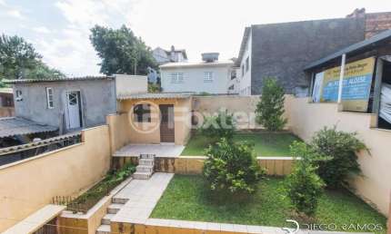 Casa com 3 quartos à venda na Avenida Ipê, 298, Vila Jardim, Porto Alegre, 192 m2 por R$ 855.000