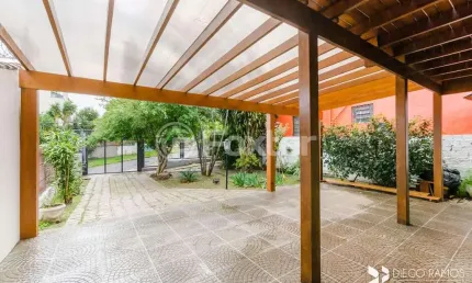 Casa com 3 quartos à venda na Rua São Mateus, 658, Jardim do Salso, Porto Alegre, 264 m2 por R$ 1.045.000