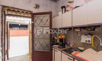 Casa com 4 quartos à venda na Avenida Ferroviária, 1248, Humaitá, Porto Alegre, 99 m2 por R$ 340.000