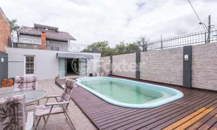Casa com 4 quartos à venda na Rua Gregório da Fonseca, 331, Nonoai, Porto Alegre, 238 m2 por R$ 790.000