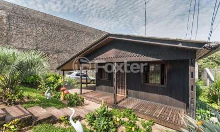 Casa com 6 quartos à venda na Estrada João de Oliveira Remião, 2762, Lomba do Pinheiro, Porto Alegre, 320 m2 por R$ 585.000