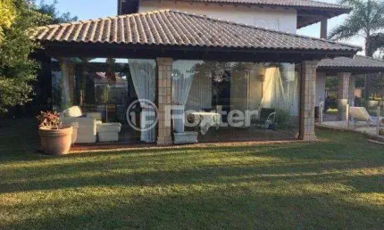 Casa com 4 quartos à venda na Rua Emboá, 1476, Atlântida, Xangri-Lá, 420 m2 por R$ 2.057.700