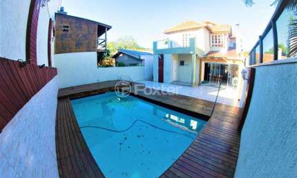 Casa em condomínio fechado com 4 quartos à venda na Rua Professor Antônio José Remião, 15, Espírito Santo, Porto Alegre, 297 m2 por R$ 890.000