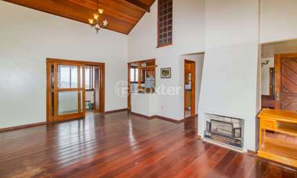Casa em condomínio fechado com 5 quartos à venda na Rua Alcebíades Antônio dos Santos, 356, Nonoai, Porto Alegre, 383 m2 por R$ 1.060.000