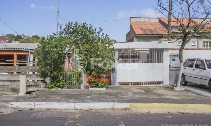 Casa com 3 quartos à venda na Avenida dos Prazeres, 206, Vila Jardim, Porto Alegre, 124 m2 por R$ 389.000