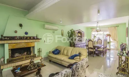 Casa com 4 quartos à venda na Rua Menezes Paredes, 208, Nonoai, Porto Alegre, 262 m2 por R$ 1.330.000