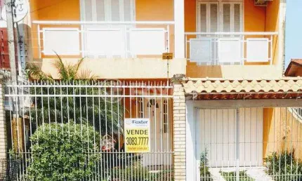 Casa com 3 quartos à venda na Rua Tesourinha, 174, Jardim Algarve, Alvorada, 220 m2 por R$ 371.000