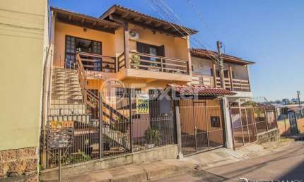 Casa com 5 quartos à venda na Rua Waldomiro Silveira Dias, 40, Jardim Itu Sabará, Porto Alegre, 253 m2 por R$ 450.000