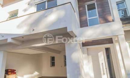 Casa em condomínio fechado com 3 quartos à venda na Rua Doutor Arnaldo da Silva Ferreira, 285, Jardim Isabel, Porto Alegre, 237 m2 por R$ 1.250.000