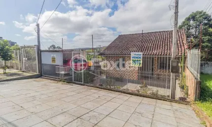 Casa com 3 quartos à venda na Avenida da Cavalhada, 5508, Cavalhada, Porto Alegre, 270 m2 por R$ 400.000