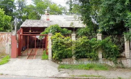 Casa com 5 quartos à venda na avenida heitor vieira, 794, belém novo, porto alegre, 132 m2 por r$ 700.000