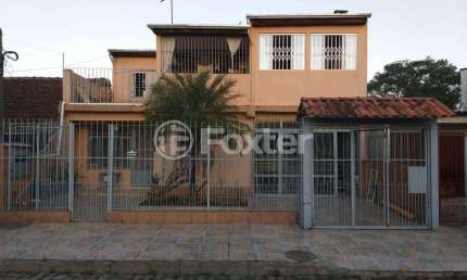 Casa com 4 quartos à venda na Acesso Três, 4258, Restinga, Porto Alegre, 250 m2 por R$ 280.000