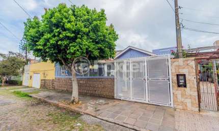 Casa com 4 quartos à venda na Rua Vinte e Um de Agosto, 72, Cavalhada, Porto Alegre, 300 m2 por R$ 680.000