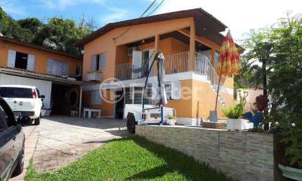 Casa com 3 quartos à venda na Rua José Alves de Castro, 468, Vila Nova, Porto Alegre, 200 m2 por R$ 690.000