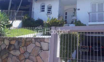 Casa com 5 quartos à venda na Rua Araponga, 174, Chácara das Pedras, Porto Alegre, 308 m2 por R$ 2.000.000