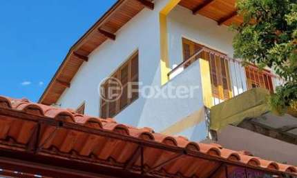 Casa com 5 quartos à venda na Avenida Luiz Moschetti, 190, Vila João Pessoa, Porto Alegre, 265 m2 por R$ 848.900
