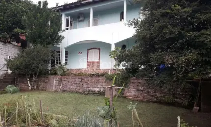 Casa com 4 quartos à venda na Rua Dante Poggetti, 186, Jardim Itu Sabará, Porto Alegre, 308 m2 por R$ 590.000