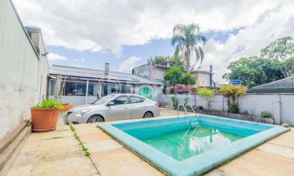 Casa com 3 quartos à venda na Rua Pasteur, 610, Ipanema, Porto Alegre, 211 m2 por R$ 920.000