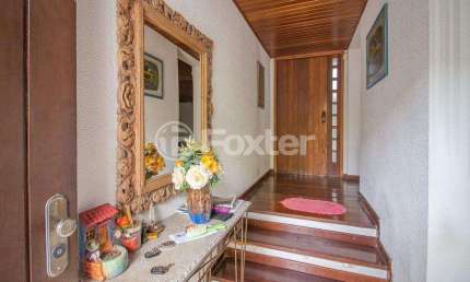 Casa com 4 quartos à venda na Rua Miguel Tostes, 806, Rio Branco, Porto Alegre, 280 m2 por R$ 1.700.000