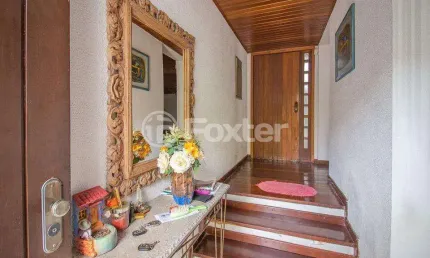Casa com 4 quartos à venda na Rua Miguel Tostes, 806, Rio Branco, Porto Alegre, 280 m2 por R$ 1.700.000