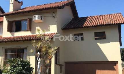 Casa com 3 quartos à venda na Rua Kyve T. Knijnik, 80, Espírito Santo, Porto Alegre, 164 m2 por R$ 795.000