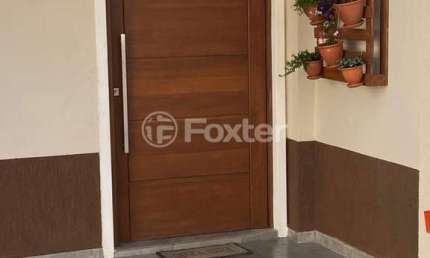 Casa em condomínio fechado com 3 quartos à venda na Rua Antônio Lourenço Rosa, 225, Mato Grande, Canoas, 112 m2 por R$ 435.000