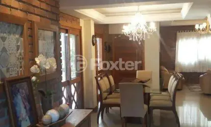 Casa em condomínio fechado com 3 quartos à venda na Rua José Henrique Barbosa dos Santos, 240, Dom Feliciano, Gravataí, 330 m2 por R$ 950.000