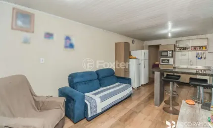 Casa com 3 quartos à venda na Rua Germano Bonow Filho, 379, Hípica, Porto Alegre, 100 m2 por R$ 256.500