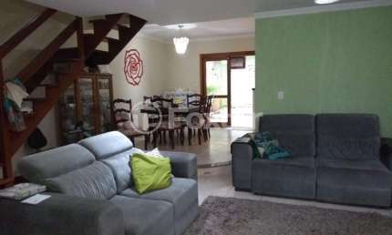 Casa com 3 quartos à venda na Rua Claudio da Silva Pinto, 34, Espírito Santo, Porto Alegre, 160 m2 por R$ 803.225
