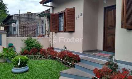 Casa com 5 quartos à venda na Rua Paul Harris, 893, Jardim Itu Sabará, Porto Alegre, 300 m2 por R$ 620.000