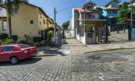 Casa em condomínio fechado com 3 quartos à venda na Rua Padre João Batista Reus, 2133, Camaquã, Porto Alegre, 152 m2 por R$ 470.000