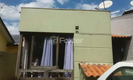 Casa com 3 quartos à venda na Rua Colibris, 796, Jardim Algarve, Alvorada, 61 m2 por R$ 190.000