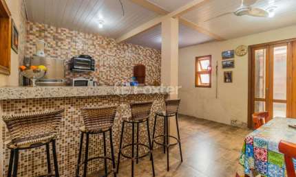 Casa com 5 quartos à venda na Rua Delmar Kuhn, 75, Hípica, Porto Alegre, 135 m2 por R$ 351.000