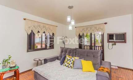 Casa com 3 quartos à venda na Rua Samaritana, 61, Jardim Itu Sabará, Porto Alegre, 271 m2 por R$ 990.000