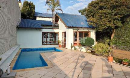 Casa com 5 quartos à venda na Rua Mozart, 133, Três Figueiras, Porto Alegre, 396 m2 por R$ 1.895.000