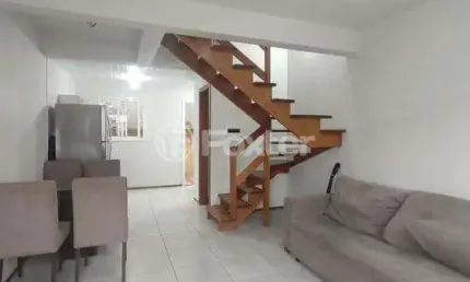 Casa em condomínio fechado com 2 quartos à venda na Rua Capitão Pedroso, 416, Restinga, Porto Alegre, 82 m2 por R$ 180.000