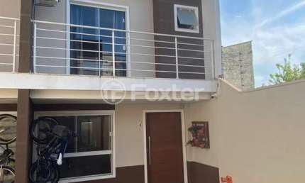 Casa em condomínio fechado com 3 quartos à venda na Rua Antônio Lourenço Rosa, 225, Mato Grande, Canoas, 94 m2 por R$ 405.000