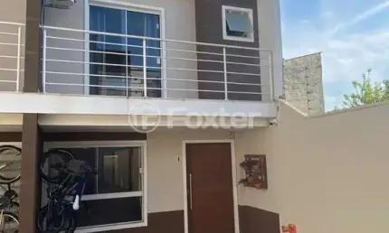 Casa em condomínio fechado com 3 quartos à venda na Rua Antônio Lourenço Rosa, 225, Mato Grande, Canoas, 94 m2 por R$ 405.000