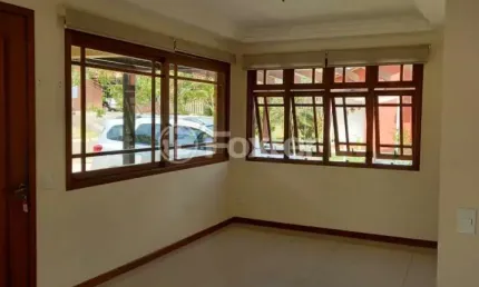 Casa em condomínio fechado com 4 quartos à venda na Rua dos Cardeais, 187, Tarumã, Viamão, 177 m2 por R$ 890.000