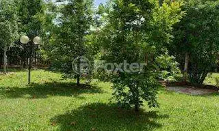 Casa em condomínio fechado com 4 quartos à venda na Estrada Capitão Gentil Machado de Godoy, 4500, Vila Elsa, Viamão, 177 m2 por R$ 1.050.000