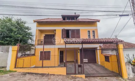 Casa com 4 quartos à venda na Travessa Clemêncio Wallau, 24, Coronel Aparício Borges, Porto Alegre, 484 m2 por R$ 780.000